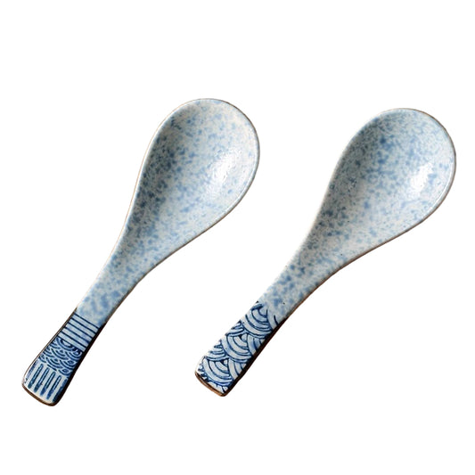 Two blue ceramic spoons with a Japanese pattern
