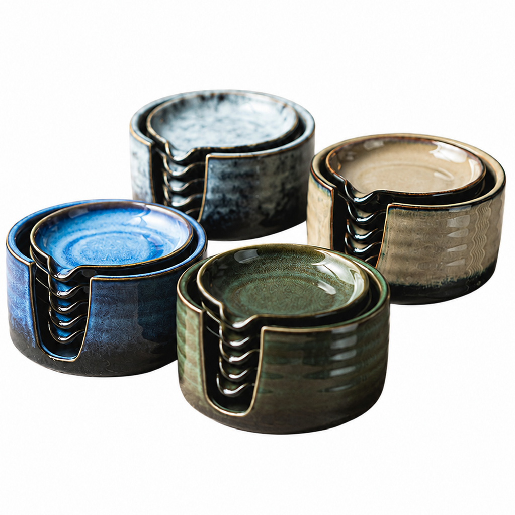 Four stacked ceramic smoking pipes in different glaze colors including blue, green, and brown, shown on a plain white background.
