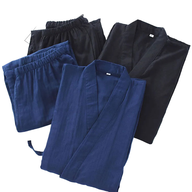 Two pairs of pants, one blue and one black, on a white background.