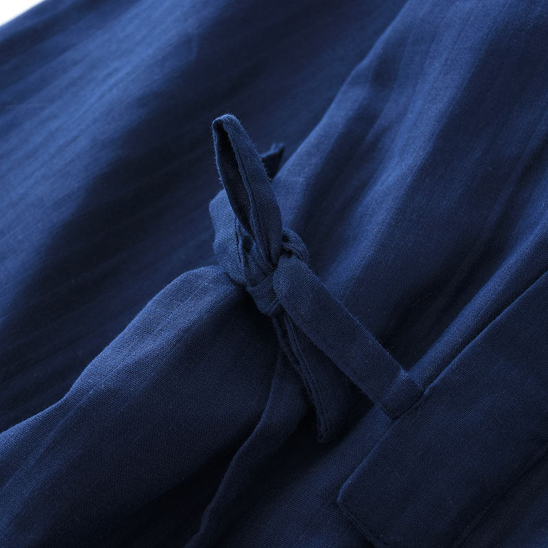 Navy blue fabric with a bow detail