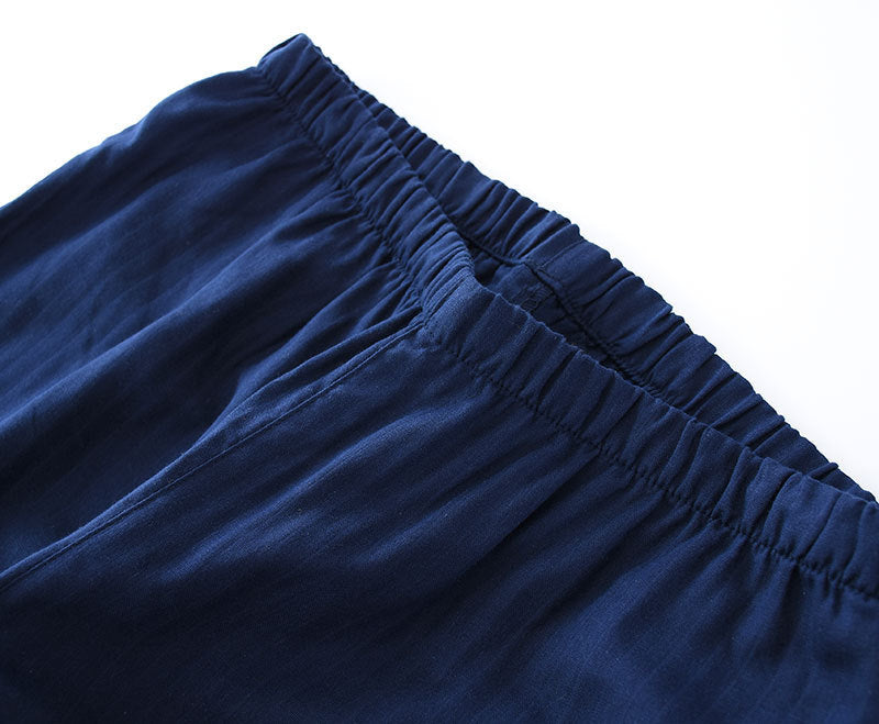 Close-up of blue pants with a white background