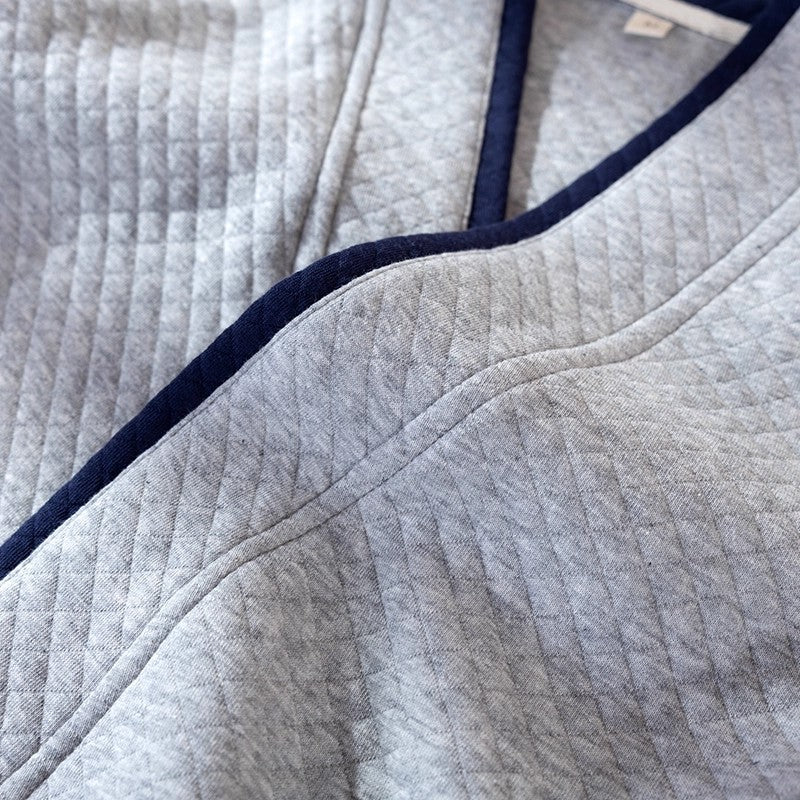 Close-up of a textured fabric with a blue border